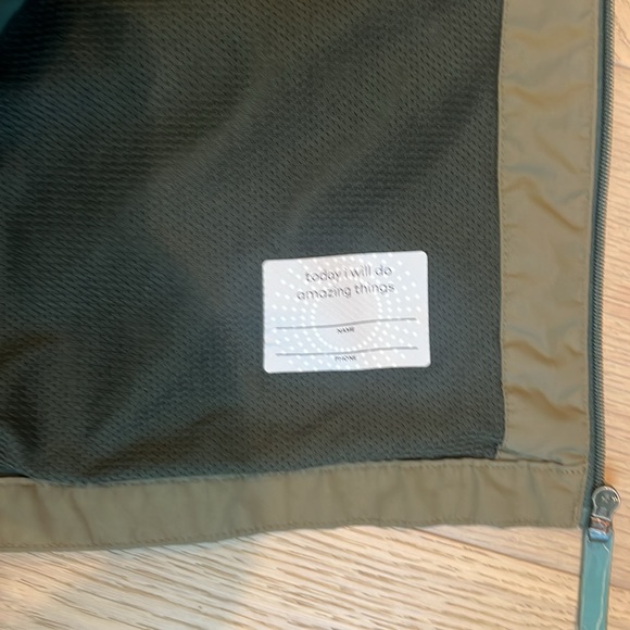 Champion army green hooded shell windbreaker jacket. Super cute details. 8/10. - Picture 3 of 6